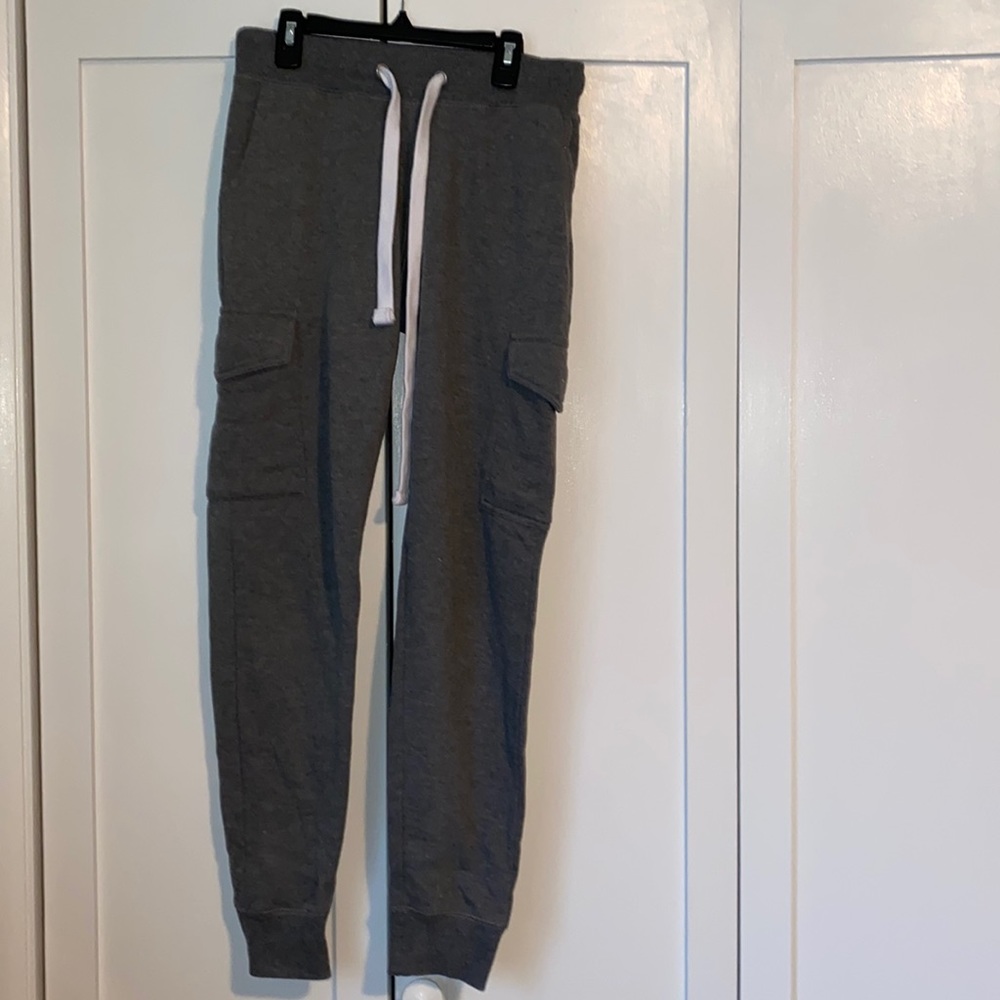 Reflex- grey, fuzzy, joggers with pockets on the sides.